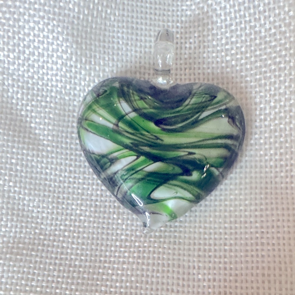 Beautiful heart, necklace, and green swirls hard plastic very beautiful